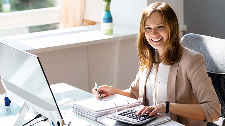 Female Accountant Working in Office